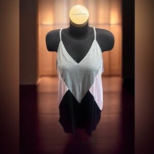 Beautiful flowy block-colored light pink, gray, and black tank